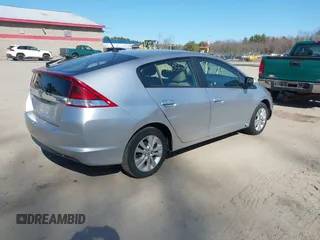 2013 Honda Insight EX z VIN JHMZE2H70DS005200, wystawiony jako IAAI lot #42105624 z przebiegiem 108 949 mil mil oraz . Historia ofert i sprzedaży dostępna na DreamBid. Obrazek 4.