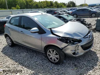 2012 Mazda Mazda2 Sport with VIN JM1DE1KZXC0140257, listed as a Copart auction lot 70361264 with 55,266 mi miles and Salvage Title. Bid and sale history available at carsss.com. Image 4.