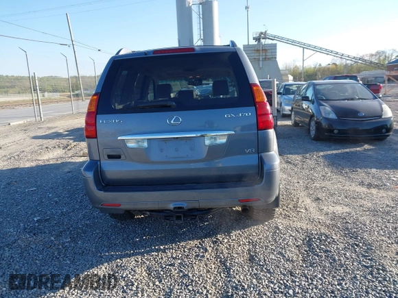 2004 Lexus GX 470 with VIN JTJBT20X440045714, listed as a IAAI auction lot 42026723 with 237,762 mi miles. Bid and sale history available at carsss.com. Image 17.