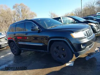 2011 Jeep Grand Cherokee 70th Anniversary with VIN 1J4RR4GT8BC504618, listed as a IAAI auction lot 40993960 with 188,098 mi miles. Bid and sale history available at carsss.com. Image 13.