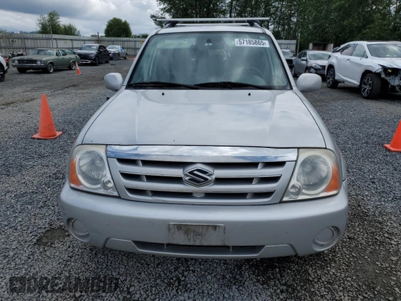 2006 Suzuki XL7 z VIN JS3TX92V564102483, wystawiony jako Copart lot #57185865 z przebiegiem 152 864 mil mil oraz Szkoda całkowita • Salvage title. Historia ofert i sprzedaży dostępna na DreamBid. Obrazek 5.