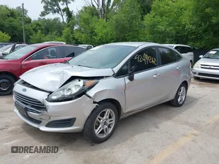 2018 Ford Fiesta SE z VIN 3FADP4BJ6JM106855, wystawiony jako IAAI lot #42491262 z przebiegiem 166 397 mil mil oraz . Historia ofert i sprzedaży dostępna na DreamBid. Obrazek 2.