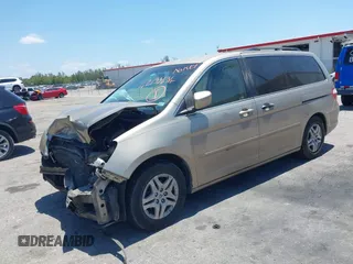 2005 Honda Odyssey EX with VIN 5FNRL38495B401742, listed as a IAAI auction lot 42133434 with 162,161 mi miles and . Bid and sale history available at carsss.com. Image 2.