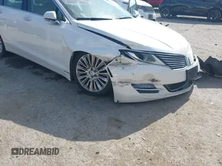 2016 Lincoln MKZ z VIN 3LN6L2G98GR618707, wystawiony jako IAAI lot #42569269 z przebiegiem 159 545 mil mil oraz . Historia ofert i sprzedaży dostępna na DreamBid. Obrazek 6.