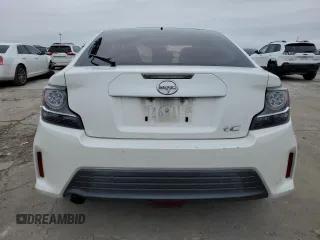 2016 Scion tC with VIN JTKJF5C73GJ019812, listed as a Copart auction lot 84228844 with 153,692 mi miles and Salvage Title. Bid and sale history available at carsss.com. Image 6.
