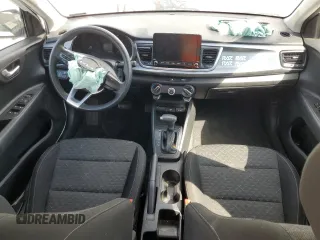 2023 Kia Rio S with VIN 3KPA24AD6PE566205, listed as a Copart auction lot 50621125 with 18,418 mi miles and Salvage Title. Bid and sale history available at carsss.com. Image 8.