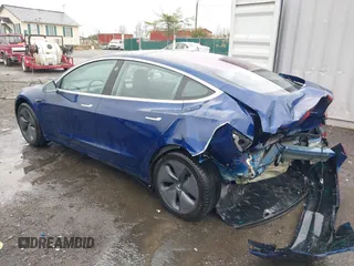 2018 Tesla Model 3 Long Range Battery with VIN 5YJ3E1EA9JF022782, listed as a IAAI auction lot 41875429 with 79,209 mi miles. Bid and sale history available at carsss.com. Image 3.