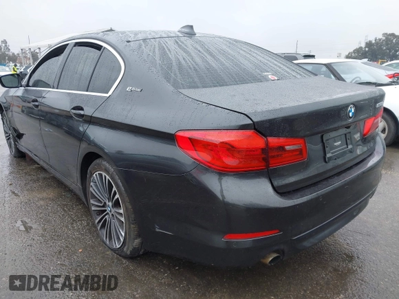 2019 BMW 5 Series 530e iPerformance with VIN WBAJA9C53KB399794, listed as a IAAI auction lot 41561874 with Not Provided miles. Bid and sale history available at carsss.com. Image 3.