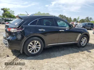 2009 Infiniti FX z VIN JNRAS18W79M153932, wystawiony jako Copart lot #52904095 z przebiegiem 170 407 mil mil oraz Szkoda całkowita • Salvage title. Historia ofert i sprzedaży dostępna na DreamBid. Obrazek 3.