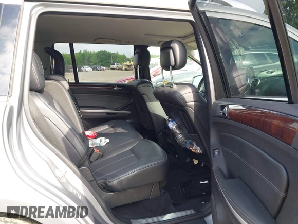 2012 Mercedes-Benz GL 450 z VIN 4JGBF7BEXCA766840, wystawiony jako IAAI lot #42521600 z przebiegiem 154 811 mil mil oraz . Historia ofert i sprzedaży dostępna na DreamBid. Obrazek 8.