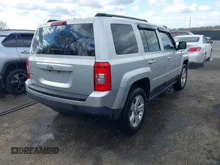 2011 Jeep Patriot Sport with VIN 1J4NF1GBXBD118483, listed as a IAAI auction lot 42039168 with 174,048 mi miles. Bid and sale history available at carsss.com. Image 4.