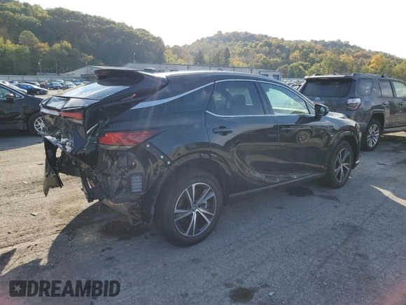 2023 Lexus RX with VIN 2T2BAMCA2PC013409, listed as a Copart auction lot 71721004 with 10,615 mi miles and Salvage Title. Bid and sale history available at carsss.com. Image 3.