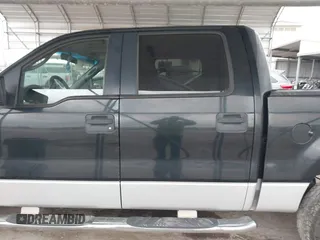 2005 Ford F-150 XLT with VIN 1FTRW12W35FB45809, listed as a IAAI auction lot 41611912 with 253,241 mi miles. Bid and sale history available at carsss.com. Image 14.