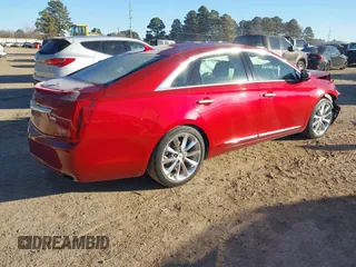 2014 Cadillac XTS Luxury with VIN 2G61M5S33E9258719, listed as a IAAI auction lot 41352068 with 51,477 mi miles. Bid and sale history available at carsss.com. Image 4.