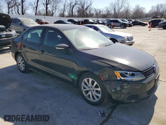 2012 Volkswagen Jetta Sedan SE w/Convenience with VIN 3VWDX7AJ2CM411783, listed as a Copart auction lot 48974555 with 128,209 mi miles and Salvage Title. Bid and sale history available at carsss.com. Image 4.