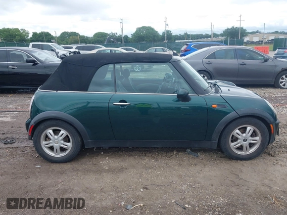 2005 MINI Convertible with VIN WMWRF33495TG11818, listed as a IAAI auction lot 42351446 with 100,033 mi miles and . Bid and sale history available at DreamBid. Image 13.