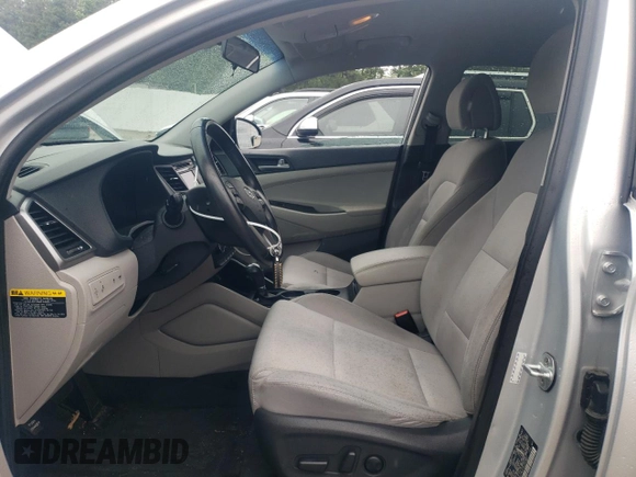 2017 Hyundai Tucson Sport with VIN KM8J33A23HU355807, listed as a Copart auction lot 58431795 with 127,353 mi miles and Salvage title. Bid and sale history available at DreamBid. Image 7.