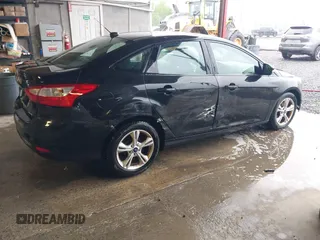 2013 Ford Focus SE with VIN 1FADP3F21DL333194, listed as a IAAI auction lot 42071641 with 107,912 mi miles. Bid and sale history available at carsss.com. Image 4.