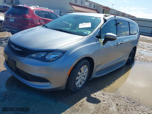 2021 Chrysler Voyager L with VIN 2C4RC1AG7MR554972, listed as a IAAI auction lot 41627734 with 94,084 mi miles. Bid and sale history available at carsss.com. Image 2.