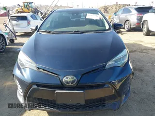 2019 Toyota Corolla L with VIN 5YFBURHE7KP922064, listed as a IAAI auction lot 41977741 with 54,896 mi miles and . Bid and sale history available at DreamBid. Image 12.