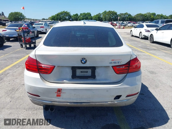 2015 BMW 4 Series 428i with VIN WBA4A5C58FGK15335, listed as a IAAI auction lot 41723243 with 152,652 mi miles and . Bid and sale history available at DreamBid. Image 15.