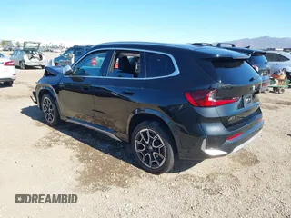 2023 BMW X1 xDrive28i with VIN WBX73EF05P5W59704, listed as a IAAI auction lot 41319741 with 11,637 mi miles. Bid and sale history available at carsss.com. Image 3.