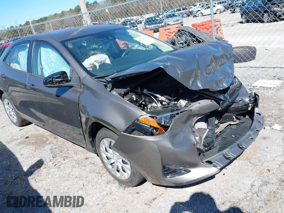 2018 Toyota Corolla L z VIN 5YFBURHE2JP779796, wystawiony jako IAAI lot #41796329 z przebiegiem 44 012 mil mil oraz . Historia ofert i sprzedaży dostępna na DreamBid. Obrazek 1.