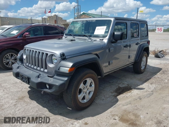 2021 Jeep Wrangler Unlimited Freedom z VIN 1C4HJXDN2MW544730, wystawiony jako IAAI lot #42624402 z przebiegiem 60 993 mil mil oraz . Historia ofert i sprzedaży dostępna na DreamBid. Obrazek 2.