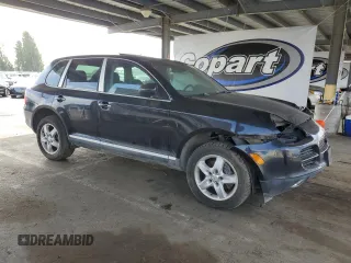 2004 Porsche Cayenne z VIN WP1AA29P94LA21185, wystawiony jako Copart lot #60576755 z przebiegiem 167 428 mil mil oraz Czysty tytuł • Clean title. Historia ofert i sprzedaży dostępna na DreamBid. Obrazek 4.
