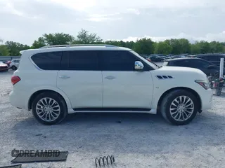 2016 Infiniti QX80 with VIN JN8AZ2NE7G9125016, listed as a IAAI auction lot 42080053 with 114,655 mi miles. Bid and sale history available at carsss.com. Image 14.