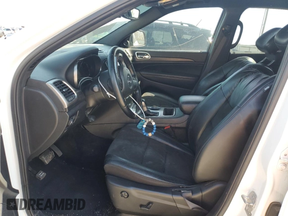2022 Jeep Grand Cherokee Laredo X with VIN 1C4RJEAG1NC155952, listed as a Copart auction lot 52170235 with 74,695 mi miles and Salvage title. Bid and sale history available at DreamBid. Image 7.