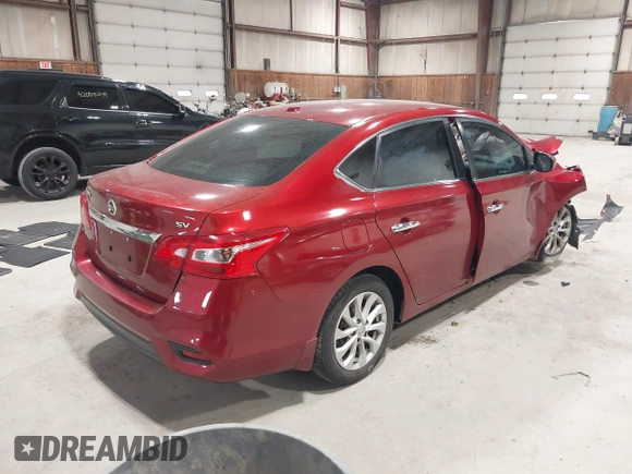 2019 Nissan Sentra S z VIN 3N1AB7AP7KY257283, wystawiony jako IAAI lot #42012338 z przebiegiem 103 503 mil mil oraz . Historia ofert i sprzedaży dostępna na DreamBid. Obrazek 4.