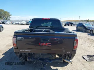 2016 GMC Sierra 1500 SLT with VIN 3GTU2NEC4GG285688, listed as a IAAI auction lot 40394598 with 121,940 mi miles and . Bid and sale history available at DreamBid. Image 16.