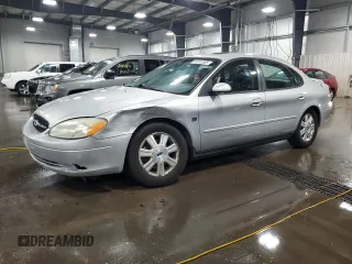2003 Ford Taurus SEL Deluxe with VIN 1FAHP56S33G104567, listed as a Copart auction lot 61357585 with 85,766 mi miles and Salvage title. Bid and sale history available at DreamBid. Image 1.