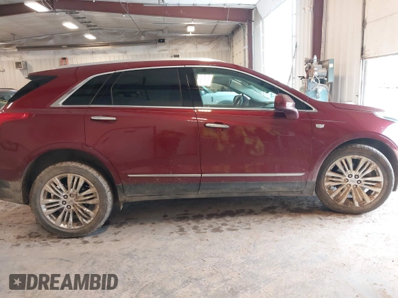 2018 Cadillac XT5 Premium Luxury AWD z VIN 1GYKNFRS6JZ114464, wystawiony jako IAAI lot #42320302 z przebiegiem 61 231 mil mil oraz . Historia ofert i sprzedaży dostępna na DreamBid. Obrazek 14.