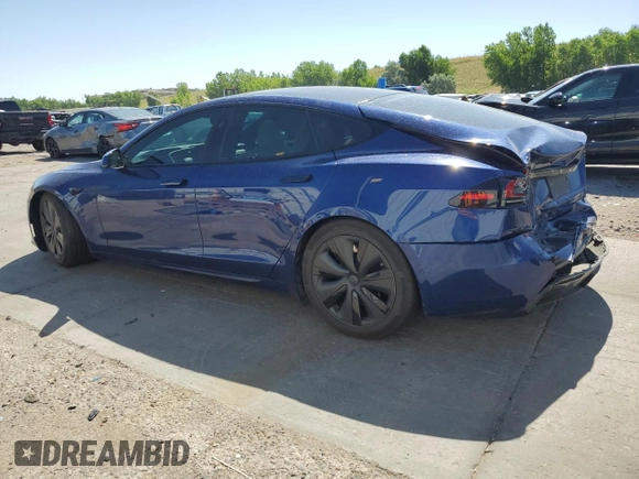 2023 Tesla Model S with VIN 5YJSA1E58PF531121, listed as a Copart auction lot 63683355 with Not provided miles and Salvage title. Bid and sale history available at DreamBid. Image 2.