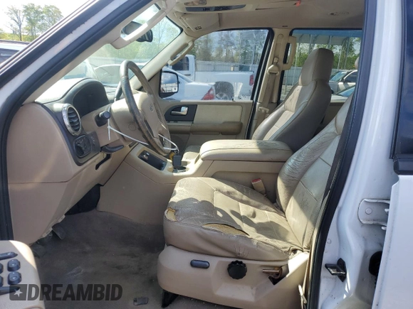 2004 Ford Expedition Special Service with VIN 1FMEU15W04LA49387, listed as a Copart auction lot 52386065 with 322,325 mi miles and Salvage title. Bid and sale history available at DreamBid. Image 7.