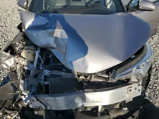 2019 Toyota C-HR XLE z VIN NMTKHMBX6KR070507, wystawiony jako Copart lot #50090175 z przebiegiem 109 471 mil mil oraz Szkody całkowita. Historia ofert i sprzedaży dostępna na DreamBid. Obrazek 11.