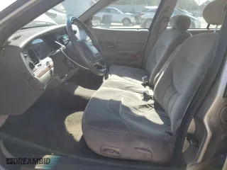 2000 Ford Crown Victoria with VIN 2FAFP73W4YX216080, listed as a Copart auction lot 53774835 with 144,404 mi miles and Salvage Title. Bid and sale history available at carsss.com. Image 7.