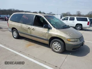 1999 Plymouth Voyager Grand SE z VIN 1P4GP44G0XB613853, wystawiony jako IAAI lot #42064199 z przebiegiem 175 050 mil mil oraz . Historia ofert i sprzedaży dostępna na DreamBid. Obrazek 1.