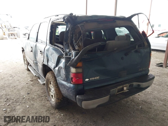 2005 Chevrolet Tahoe LS with VIN 1GNEC13V85R161605, listed as a IAAI auction lot 41631228 with 265,125 mi miles and . Bid and sale history available at DreamBid. Image 3.
