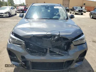 2021 BMW X1 sDrive28i z VIN WBXJG7C00M5T64693, wystawiony jako Copart lot #54013925 z przebiegiem 26 075 mil mil oraz Szkody całkowita. Historia ofert i sprzedaży dostępna na DreamBid. Obrazek 5.