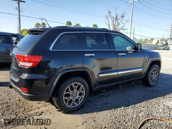 2013 Jeep Grand Cherokee Overland with VIN 1C4RJFCG2DC653207, listed as a Copart auction lot 48680885 with 276,020 mi miles and Salvage Title. Bid and sale history available at carsss.com. Image 3.