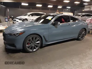2022 Infiniti Q60 Red Sport 400 with VIN JN1FV7LL4NM681132, listed as a IAAI auction lot 40733343 with 14,309 mi miles and . Bid and sale history available at DreamBid. Image 18.