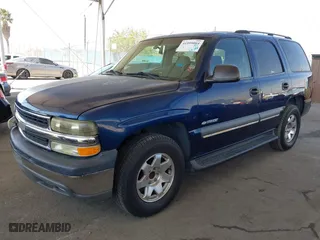 2003 Chevrolet Tahoe LS with VIN 1GNEC13V23R244296, listed as a IAAI auction lot 41999004 with 272,455 mi miles. Bid and sale history available at carsss.com. Image 2.