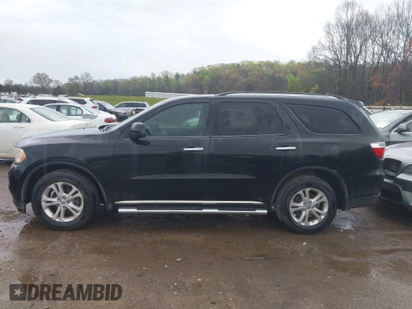 2013 Dodge Durango Crew with VIN 1C4RDHDG5DC613835, listed as a IAAI auction lot 41910643 with 155,827 mi miles and . Bid and sale history available at DreamBid. Image 14.