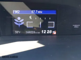 2012 Honda Civic Hybrid with VIN JHMFB4F35CS003299, listed as a IAAI auction lot 41509713 with 144,024 mi miles. Bid and sale history available at carsss.com. Image 7.