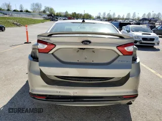 2016 Ford Fusion Titanium Hybrid with VIN 3FA6P0RU0GR153294, listed as a Copart auction lot 52723515 with 117,570 mi miles and Salvage title. Bid and sale history available at DreamBid. Image 6.