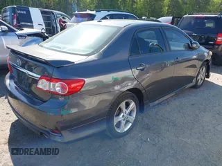 2011 Toyota Corolla L with VIN 2T1BU4EE2BC684289, listed as a IAAI auction lot 42027474 with 214,657 mi miles. Bid and sale history available at carsss.com. Image 4.