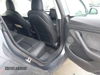 2022 Tesla Model 3 Long Range with VIN 5YJ3E1EB8NF201023, listed as a IAAI auction lot 41942943 with 30,635 mi miles and . Bid and sale history available at DreamBid. Image 8.